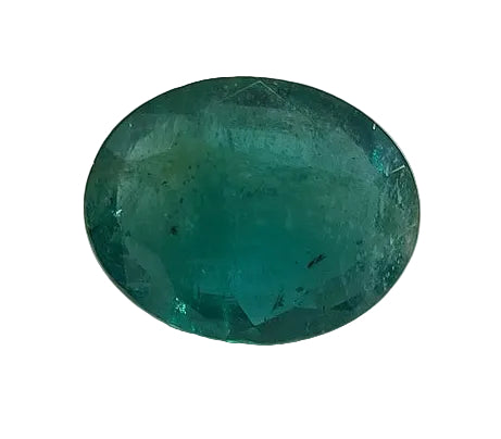 Green gemstone on a white stone with yellow background